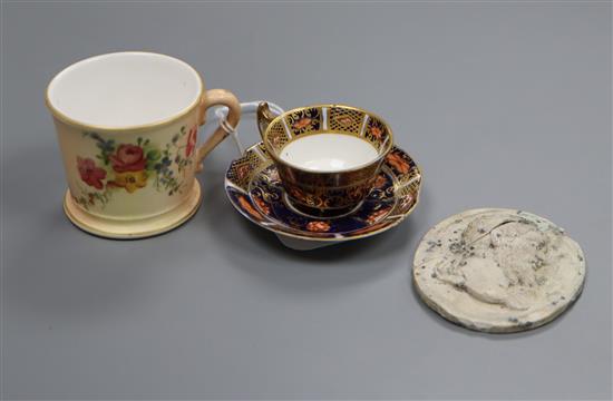 A miniature Royal Worcester mug, a miniature Royal Crown Derby cup and saucer and a Wedgwood and Bentley cameo medallion (a.f.)